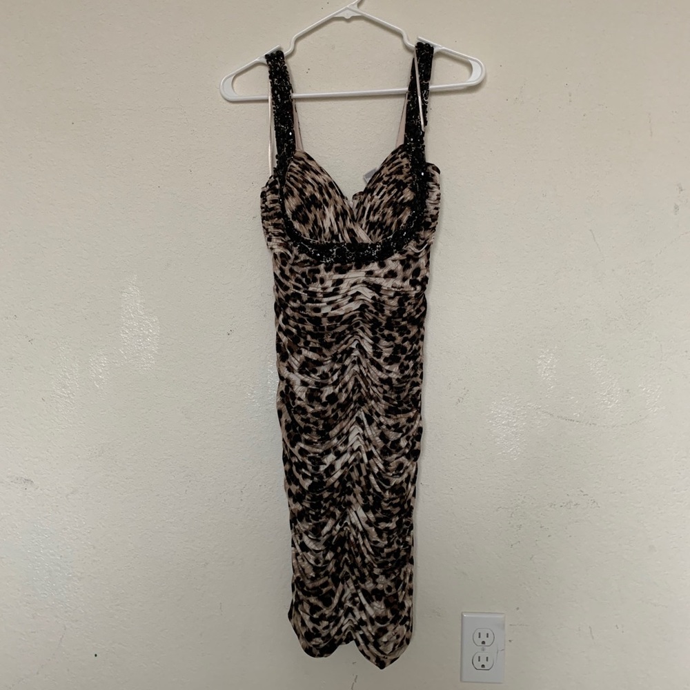 Cache’ body contour animal print, brand new with tag.